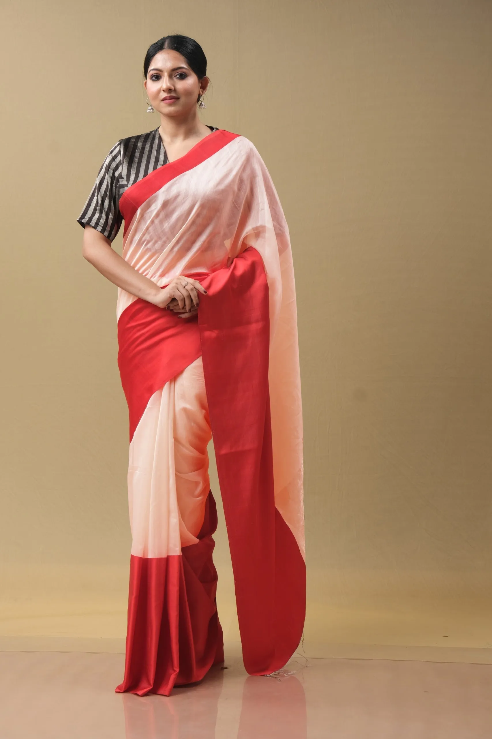 Peach and red sari with red blouse.