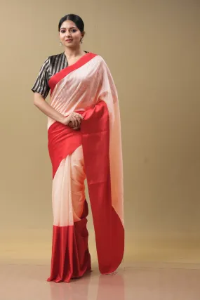 Peach and red sari with red blouse.